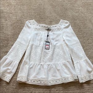 White cotton eyelet blouse